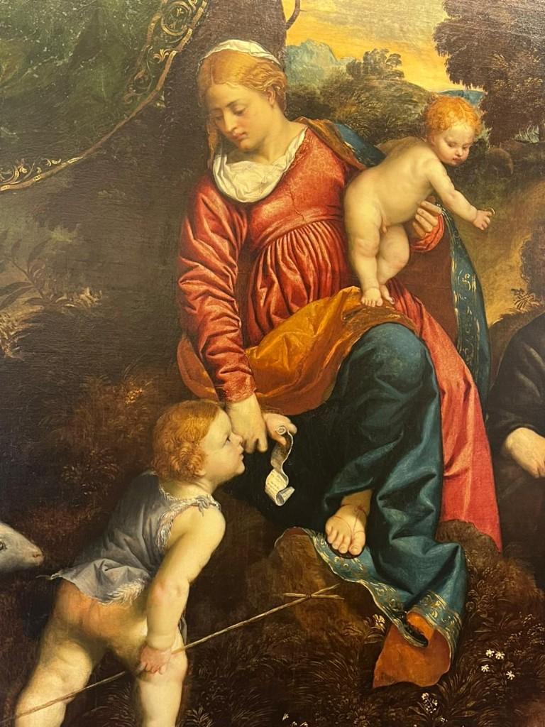 Detail from Titian’s Aldobrandini Madonna: a woman holds a curled scroll like a thermal receipt